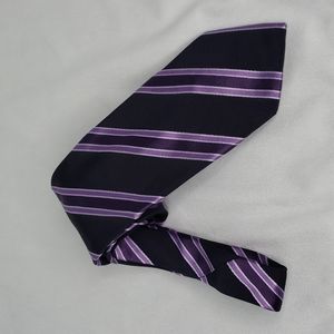 Canali silk tie. Blue with purple diagnol stripes. L 59" W 3 3/4"